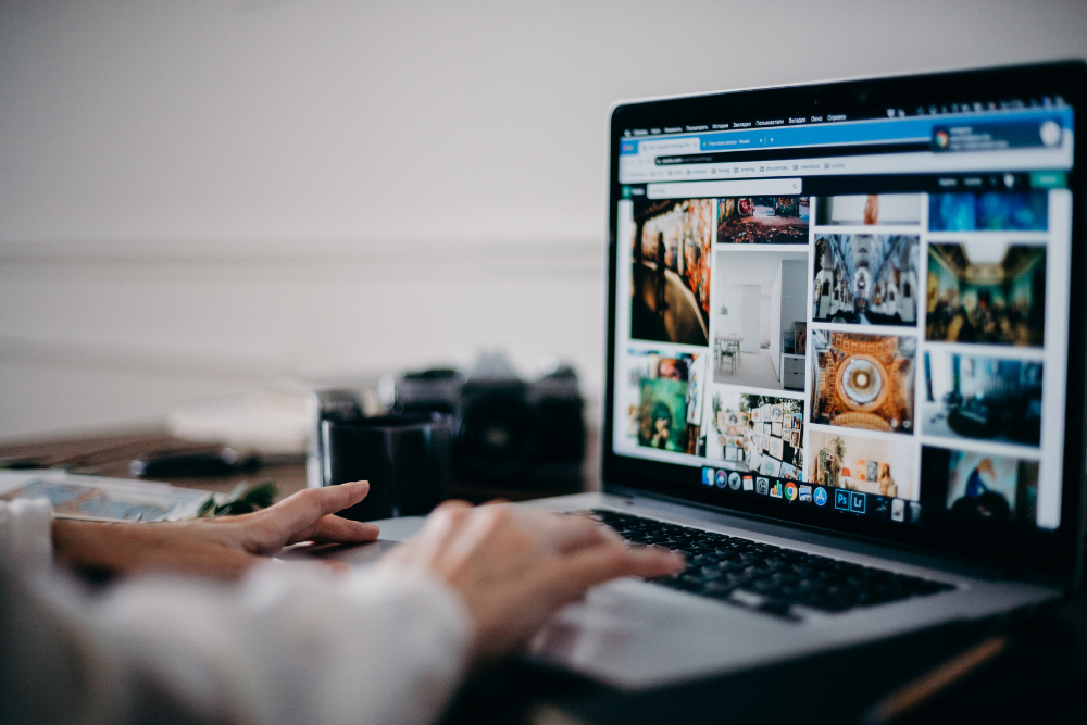 man looking at images online