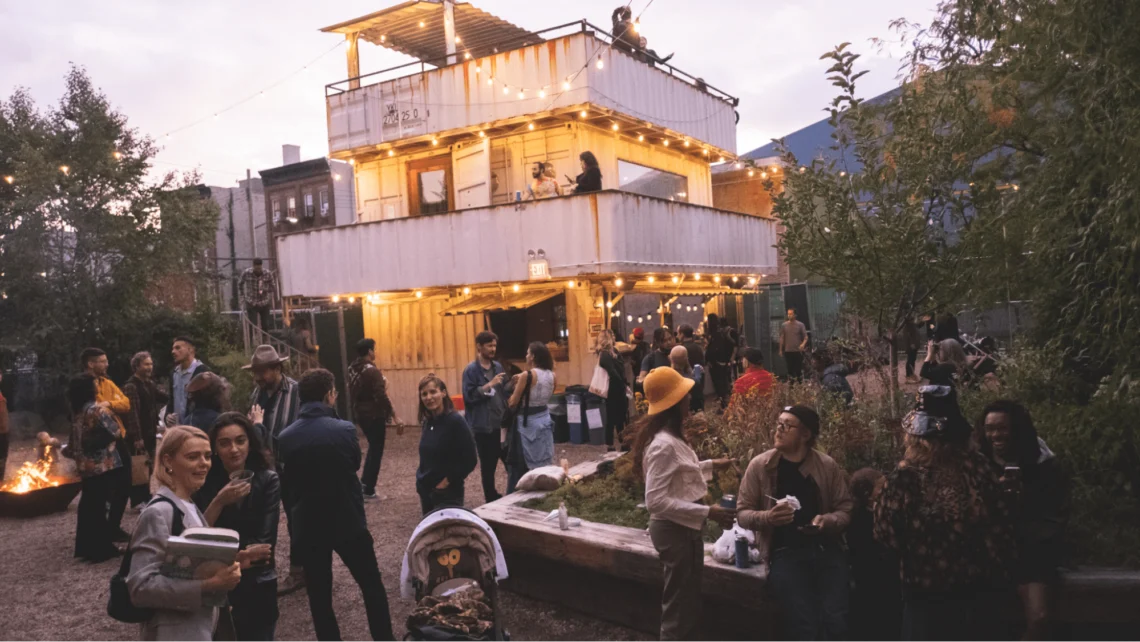 Event guests mingle outside an event venue